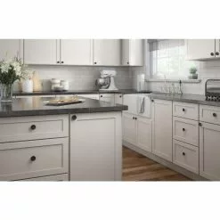 Brainerd Cabinet Knob 1.4173-In Concave Round Matte Black 12 Brainerd Cabinet Knob 1.4173-In Concave Round Matte Black -Schlage Trade 40354095